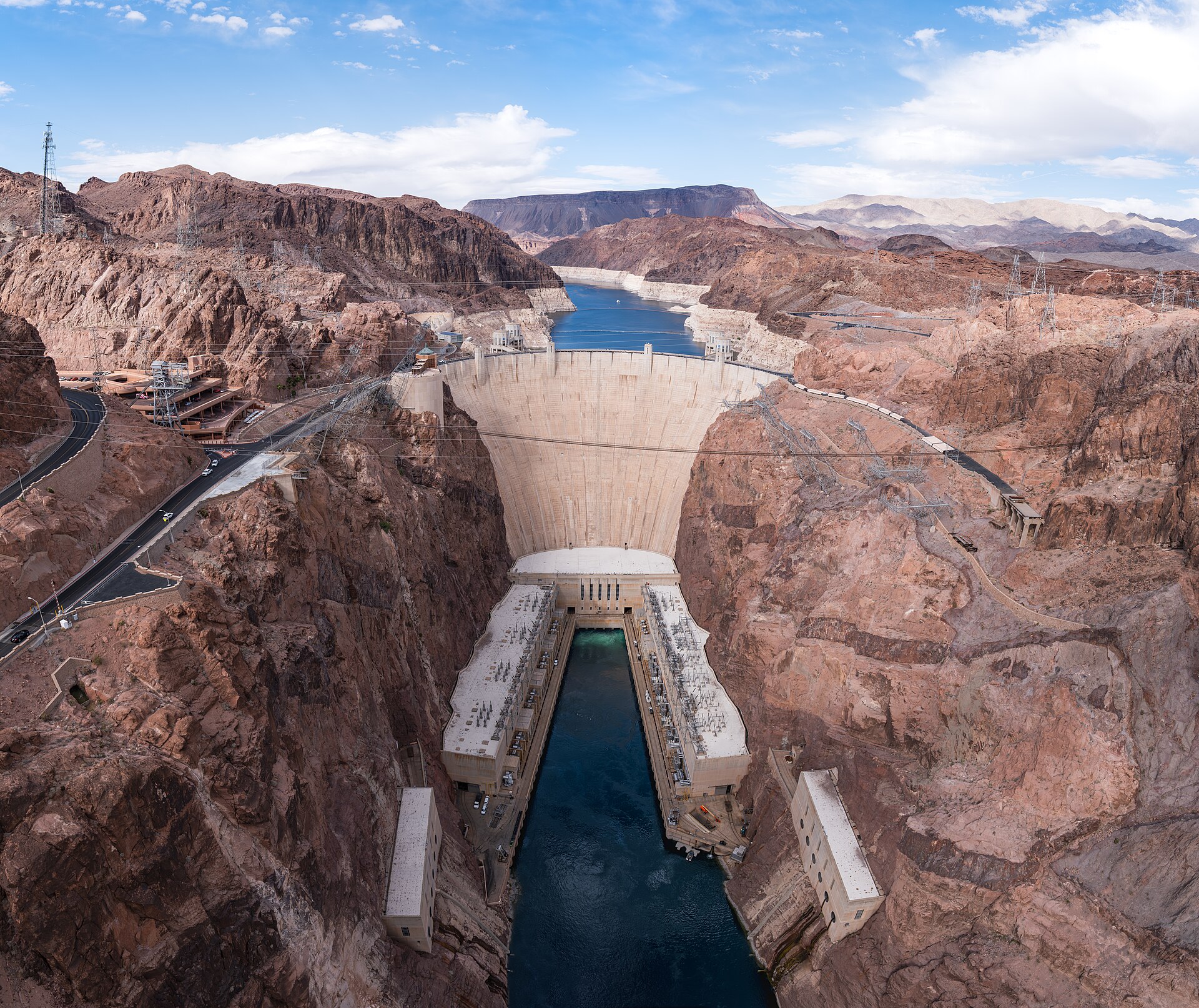 Hoover Dam and the white bathtub ring on Black Canyon walls, seen from the bypass bridge